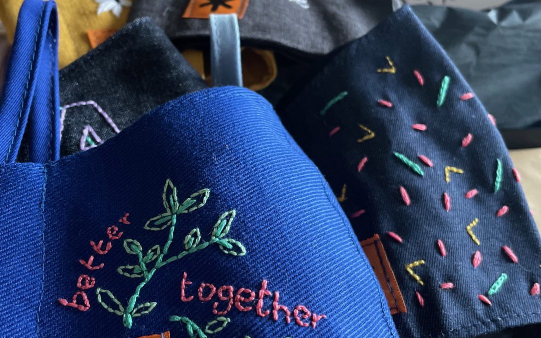 Textile partnership embroiders mask optimism